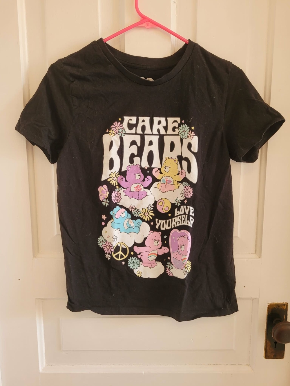 Care Bears Black Graphic Tee with Pastel Characters